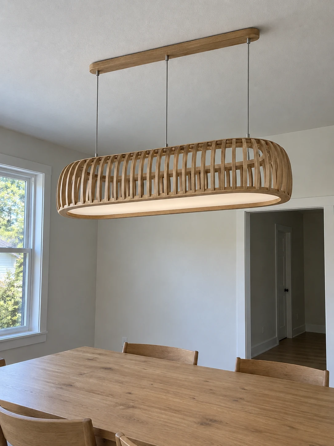 Portico 160: elongated oval chandelier with an open ribbed frame