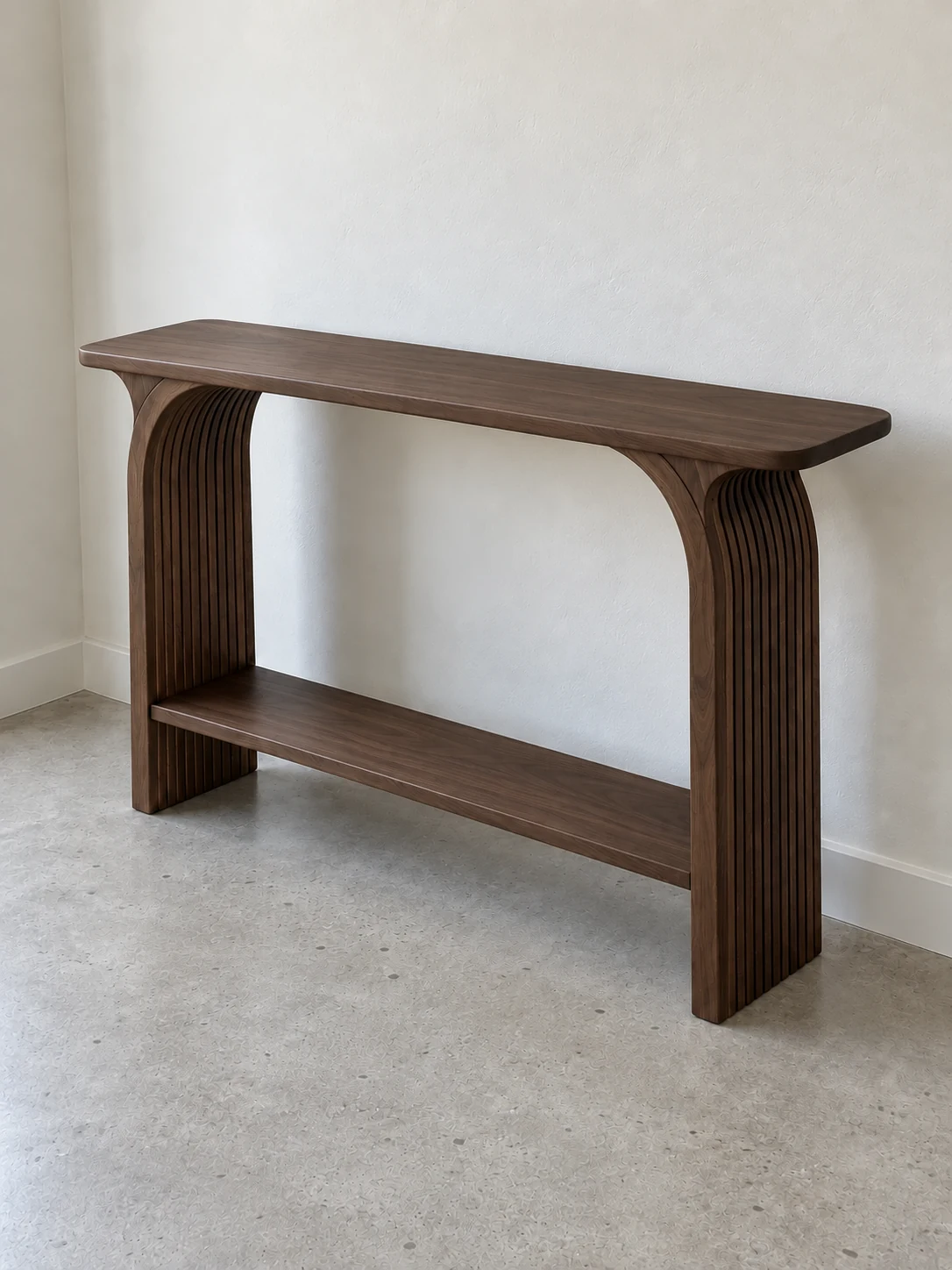 Reed console: slender console with fluted arched supports